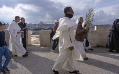 Thousands of Christians attend Palm Sunday celebrations in Jerusalem against a backdrop of war